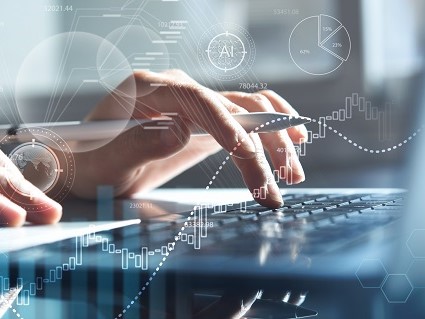 Ein Benutzer tippt auf einer Laptop-Tastatur, während Grafiken und Diagramme im Vordergrund sichtbar sind. Die Darstellung vermittelt den Eindruck von Datenanalyse und Technologie, insbesondere im Bereich Künstliche Intelligenz.