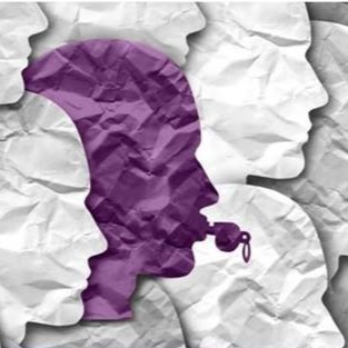 Silhouettes of human heads are depicted, with one head prominently featured in purple, holding a whistle. The background consists of crumpled white paper textures. The image symbolizes authority, communication, or the expression of voice in a crowd.
