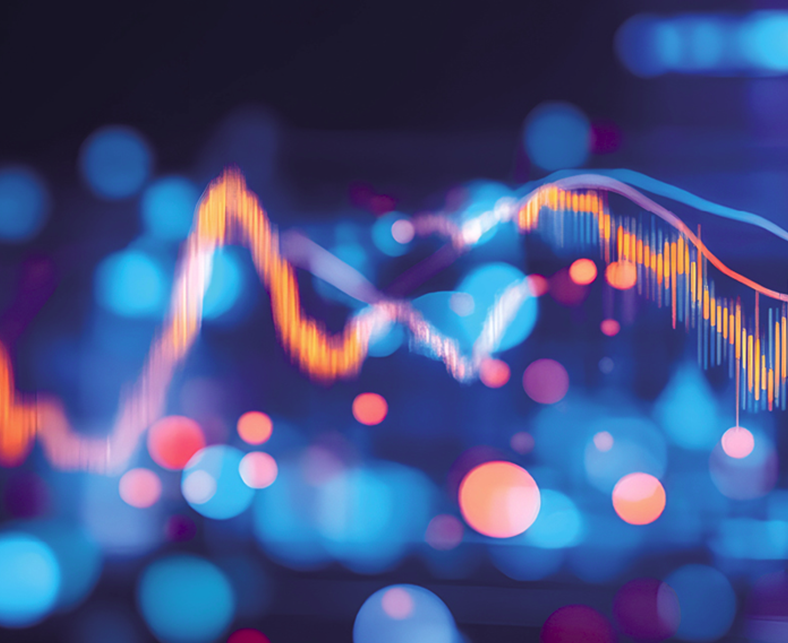 Ein verschwommener Hintergrund mit farbigen Lichtern stellt ein Daten- oder Finanzdiagramm dar. Gelbe und orange Linien zeigen Veränderungen oder Trends, während blaue und violette Farben den Hintergrund auflockern.