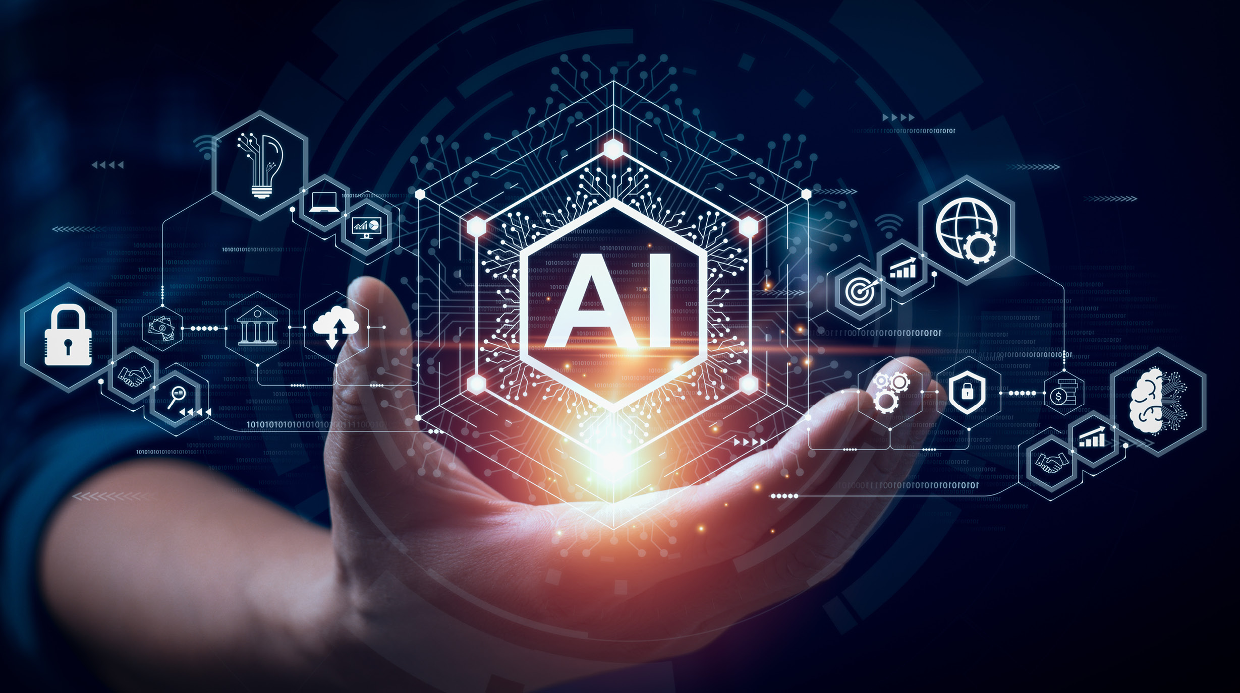 Eine Hand hält eine leuchtende Darstellung des Begriffs „AI“ (künstliche Intelligenz) umgeben von digitalen Symbolen, die Technologie und Sicherheit repräsentieren. Der Hintergrund ist dunkel und futuristisch, was die Bedeutung von Innovation und Fortschritt hervorhebt.