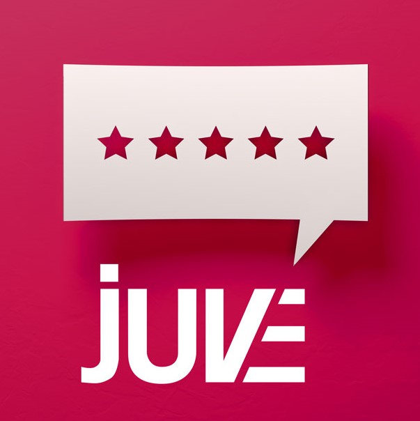 A speech bubble with five stars inside is displayed on a pink background, along with the word "JUVE" in bold, stylized letters beneath it. The image symbolizes positive feedback or a high rating, emphasizing approval or satisfaction.